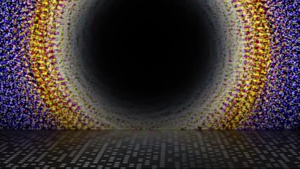 五彩斑斓的圆圈在不停地移动 中间有一个黑洞 在地面上有一个倒影 — 图库视频影像