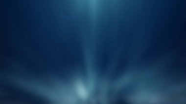 Dağılmış ışık demeti, parlak görünerek yüzmeye devam etti..