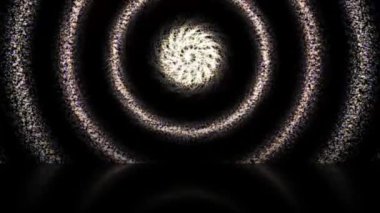 Colorful light streaks swirl across the area looking bright.