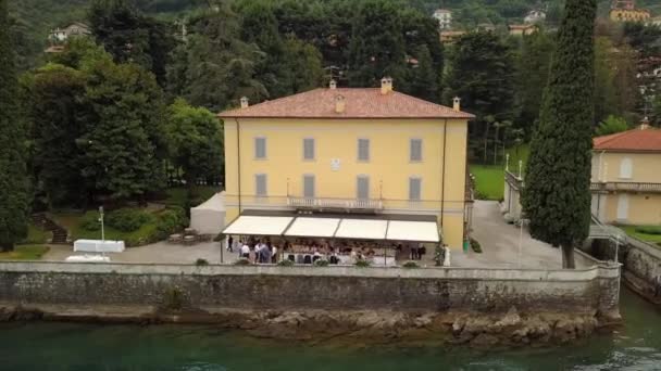 Aerial drone footage of small villa on lake Como. Lombardy, Italy. . — Video