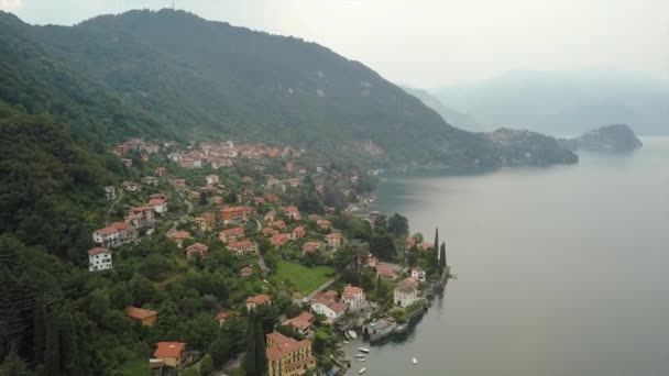 Aerial drone footage of lake Como. Lombardy, Italy. Shot with a rotation motion. — ストック動画