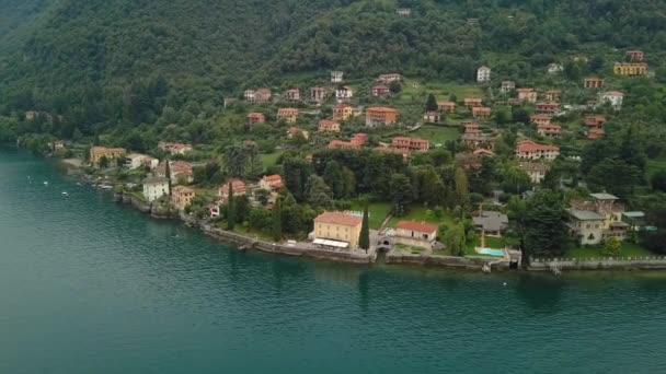 Aerial drone footage of lake Como. Lombardy, Italy. Shot with a rotation motion. — ストック動画