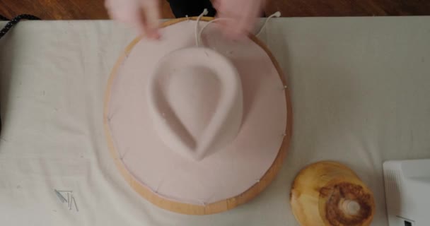 Woman Finishes Working Felt Hat Body Table Workshop Milliner Takes — Stockvideo