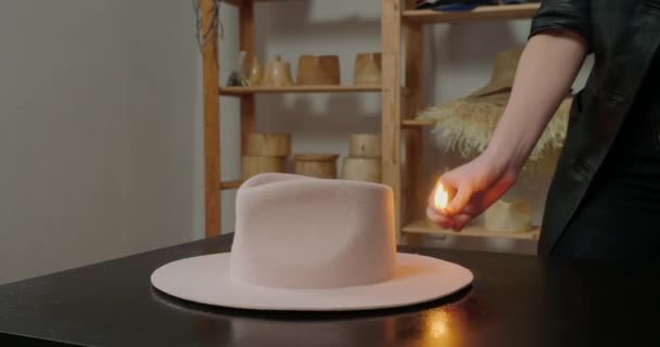 Experienced Milliner Puts Burning Match Felt Hat Set Fire Standing — Vídeos de Stock
