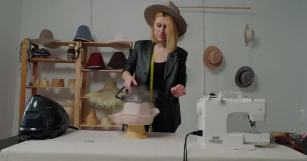 Woman Uses Iron Steam Felt Hat Blank Pulled Wooden Mold — Vídeos de Stock