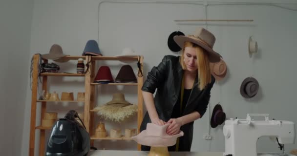 Woman Makes Shape Female Hat Hands Using Wooden Mold Table — ストック動画