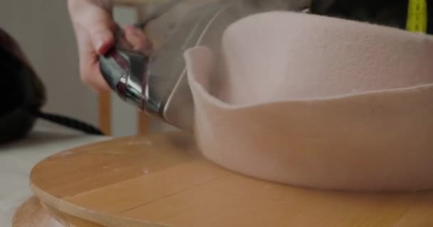 Woman Steams Felt Hat Brim Iron Wooden Mold Table Workshop — Stock videók