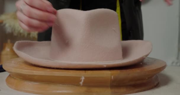 Experienced Milliner Hammers Nail Wooden Mold Brim Felt Hat Woman — Stock Video