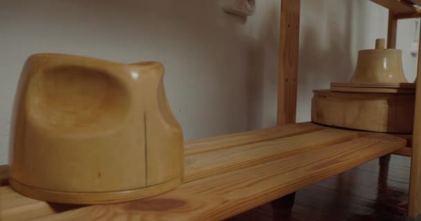 Woman Puts Wooden Molds Making Fedora Hats Rows Shelf Professional — Vídeos de Stock