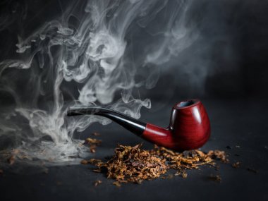 Siyah arka planda sigara, tütün ve sigara içmek. Rahat ol. Nikotin. Kanser .