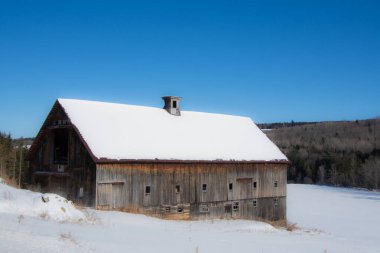Barn in winter village 