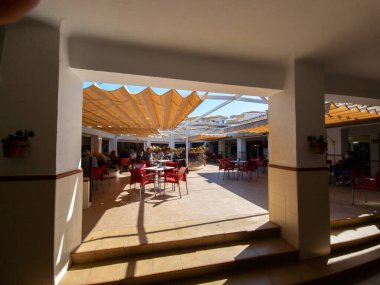 People at cafe of the Orgiva town, in the Sierra Nevada of Andalusia, Spain  