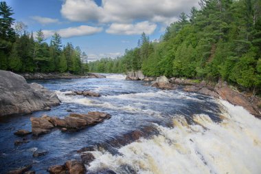 Waterfalls on a beautiful wild river in Quebec, Canada