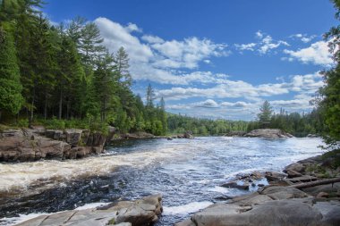 Waterfalls on a beautiful wild river in Quebec, Canada