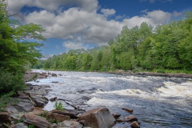 Waterfalls on a beautiful wild river in Quebec, Canada