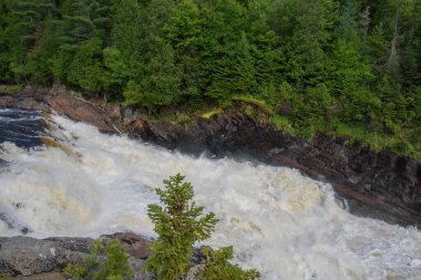 Waterfalls on a beautiful wild river in Quebec, Canada
