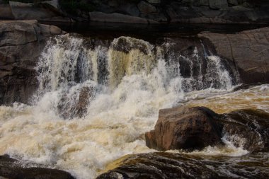 Waterfalls on a beautiful wild river in Quebec, Canada