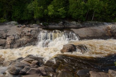 Waterfalls on a beautiful wild river in Quebec, Canada
