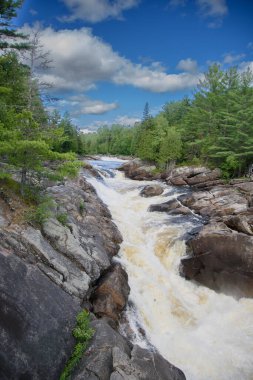Waterfalls on a beautiful wild river in Quebec, Canada