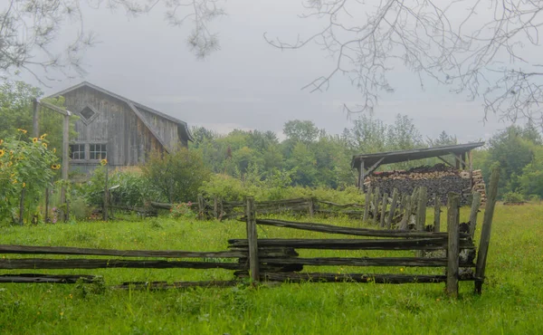 Old barn on a farm in the canadian countryside in Quebec