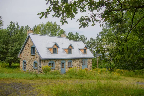 Typical architecture of a canadian house on the countryside in the province of Quebec