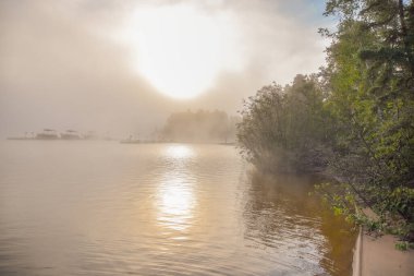 Morning mist on a Canadian lake in the province of Quebec