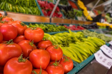 Tomatoes at the grocery counter