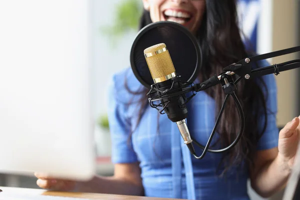 Studio black microphone in background woman sings closeup — Stock Photo, Image