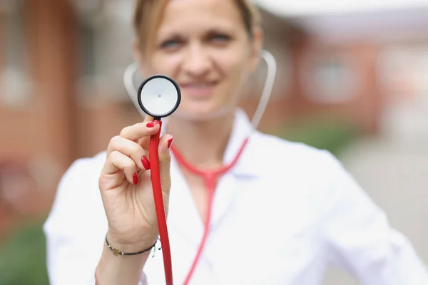 Portrait Smiling Female Doctor Holding Stethoscope Cardiology Medical Services Concept — Stock Photo, Image