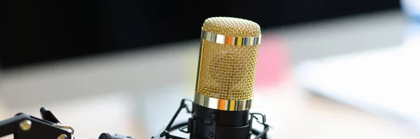 Professional microphone gold black for performances closeup