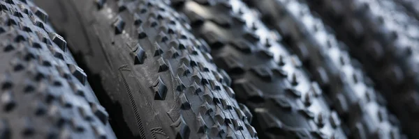 Closeup of black rubber bicycle wheel tires — Foto Stock