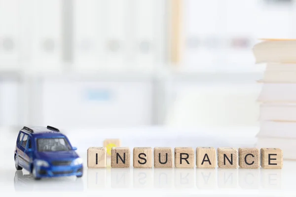 Inscription car insurance and quality assurance closeup — Stock Photo, Image