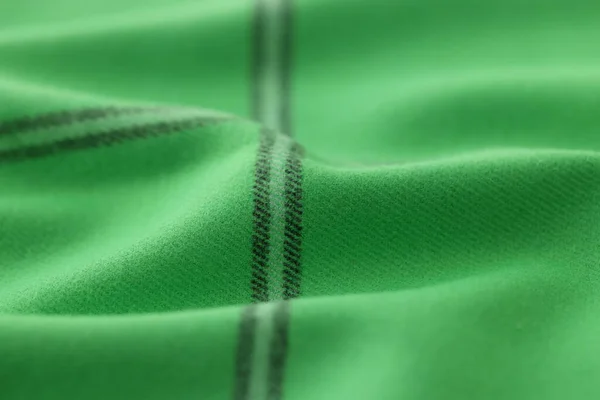 Khaki hijau hangat rajutan latar belakang wol dengan garis-garis hitam — Stok Foto