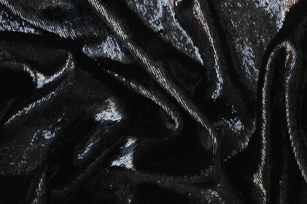 Parlak siyah ipek kumaşın yakınlaştırılmış hali