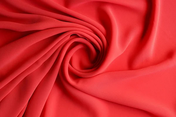 Abstrakt bakgrund lyx tyg i röd färg och vågiga veck — Stockfoto