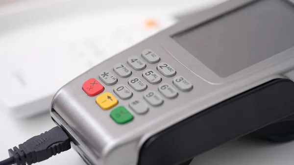 POS terminal for payment with wire closeup — Stock fotografie