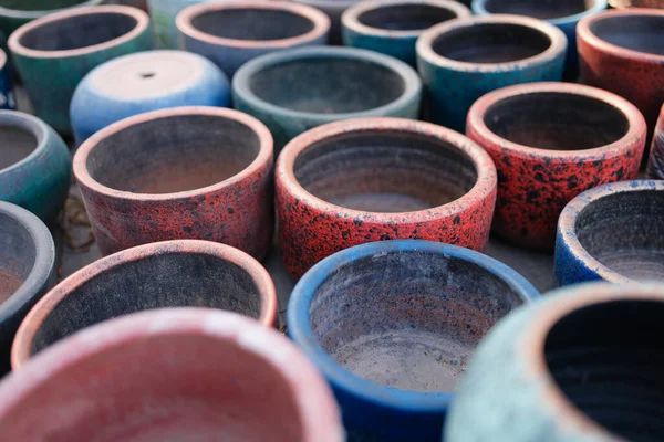 Multicolored old empty clay pots. Decorative ornament of ancient potter — Stock Photo, Image