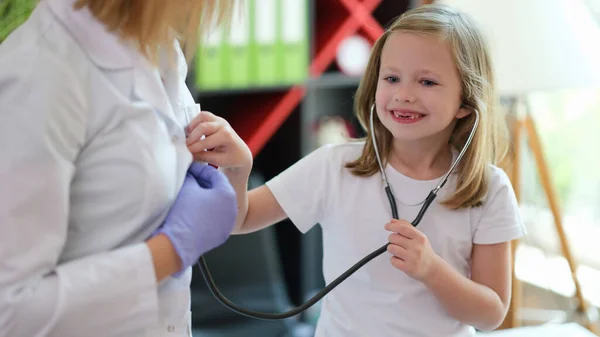Portrait Cheerful Little Girl Applying Medical Stethoscope Doctor Appointment Healthcare — Stockfoto