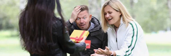 Woman Showing Gift Box Shocked Friends Emotions Joy Enthusiasm Concept — Foto de Stock