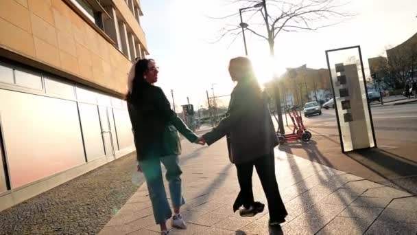 Two Lesbians in City Running to Sunset Slow Motion — Vídeos de Stock