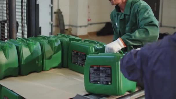 Worker Production Line Taking Canister — Stock Video