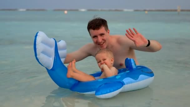Father Son Wave Camera Smiling Playing Water Rubber Toy Toddler — Video