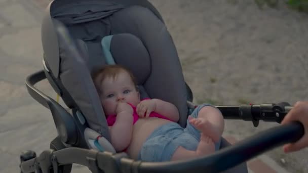 Mother Carries Stroller Little Baby Walking Beach Blurred Background Woman — Stockvideo