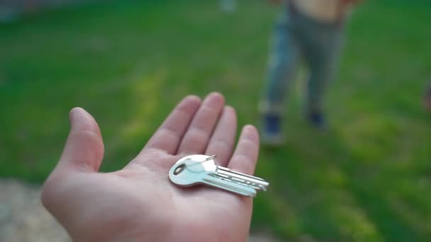 Mother Gives Keys Cute Toddler Boy Walking Green Grass Yard — Video Stock