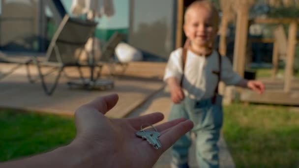 Hand Woman Giving Key Big House Little Blond Boy Walking — Vídeos de Stock