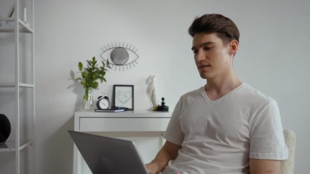 Young Man Talks Manager Video Call Using Laptop Male Freelancer — Stockvideo