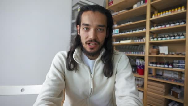 Man Talks Video Call Friend Sitting Table Shop Young Employee — Vídeo de stock