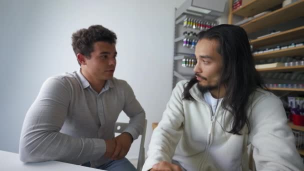 Man Helps Young Trainee Begin Work New Company Employee Turns — Vídeo de stock