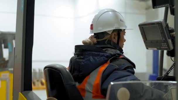 Woman White Helmet Looks Monitor Sitting Forklift Cabin Female Engineer — Wideo stockowe