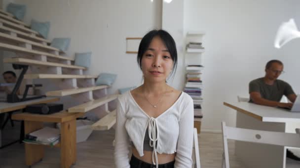 Asian Woman Waves Hello Friend Video Call Sitting Desk Office — Vídeo de stock